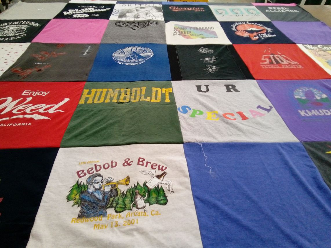 T-shirt quilt with music, community themes by Radha from CA