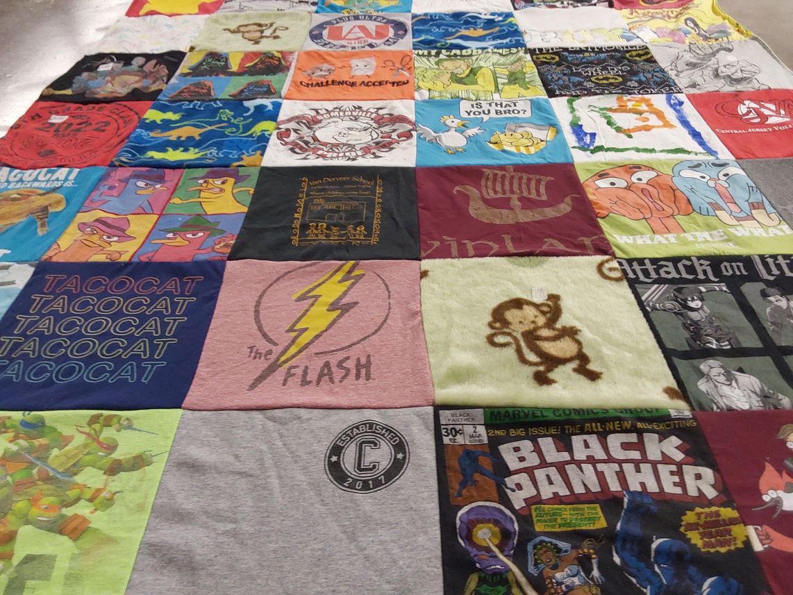 T-shirt quilt with comics, anime themes by Ann-Marie from NJ