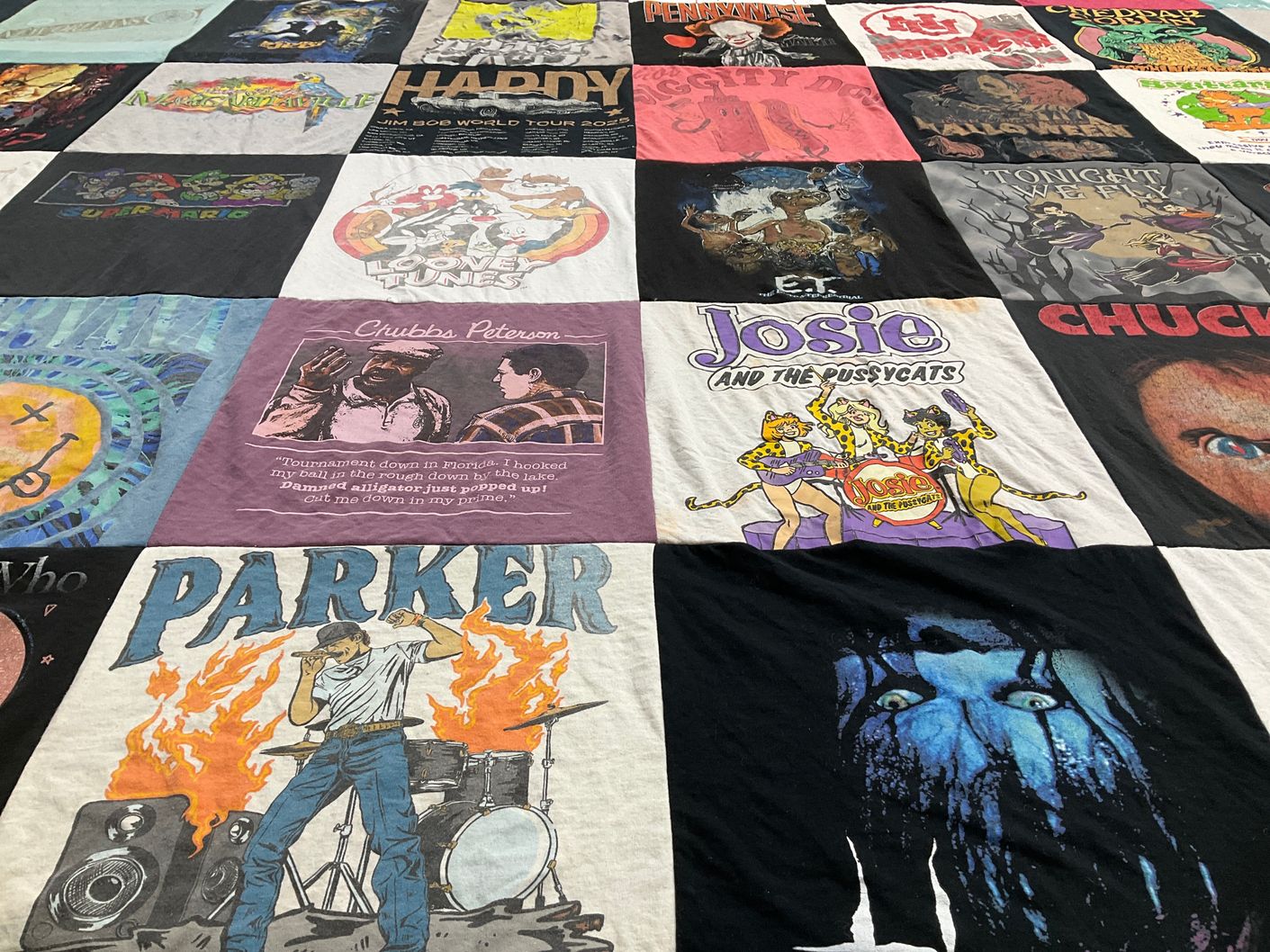 T-shirt quilt with movies, music themes by keely from GA