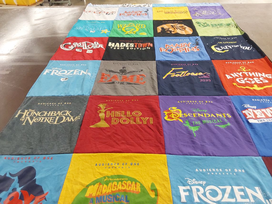 T-shirt quilt with theater, musicals themes by Margaret from CO