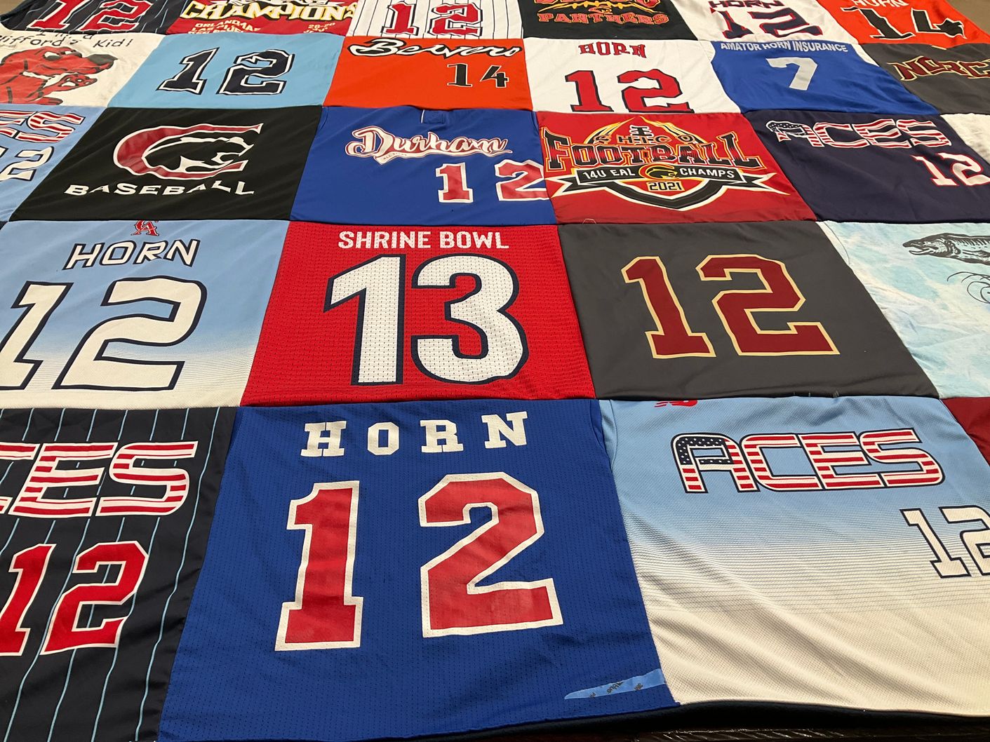 T-shirt quilt featuring horn, aces by Sommer from CA