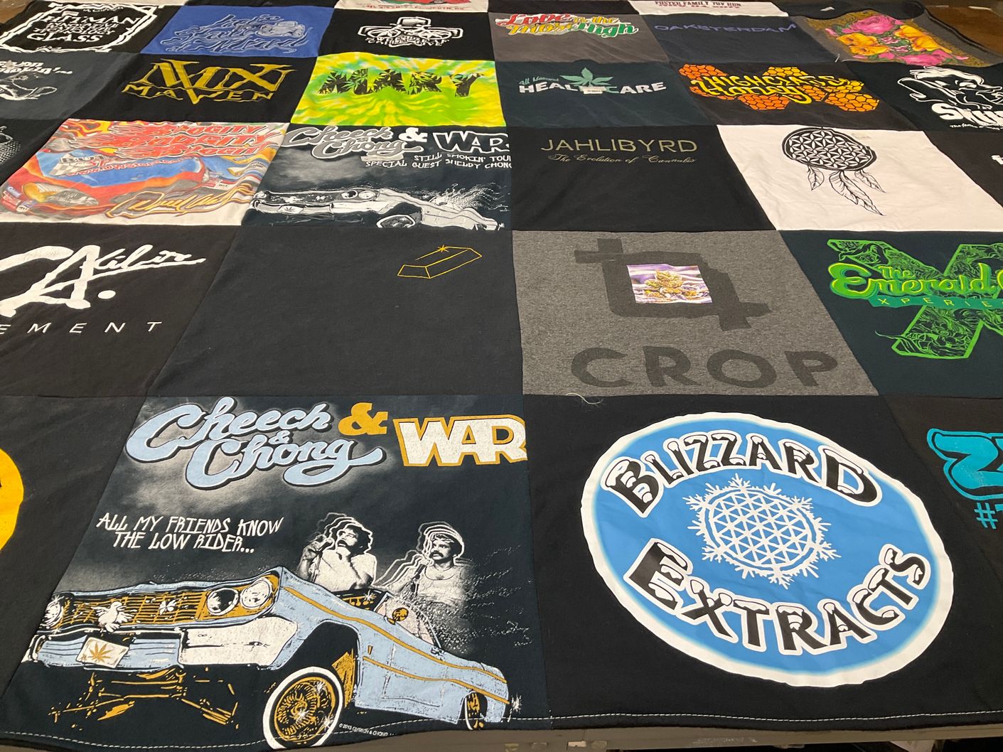 T-shirt quilt with cannabis, music themes by Kelly from CA