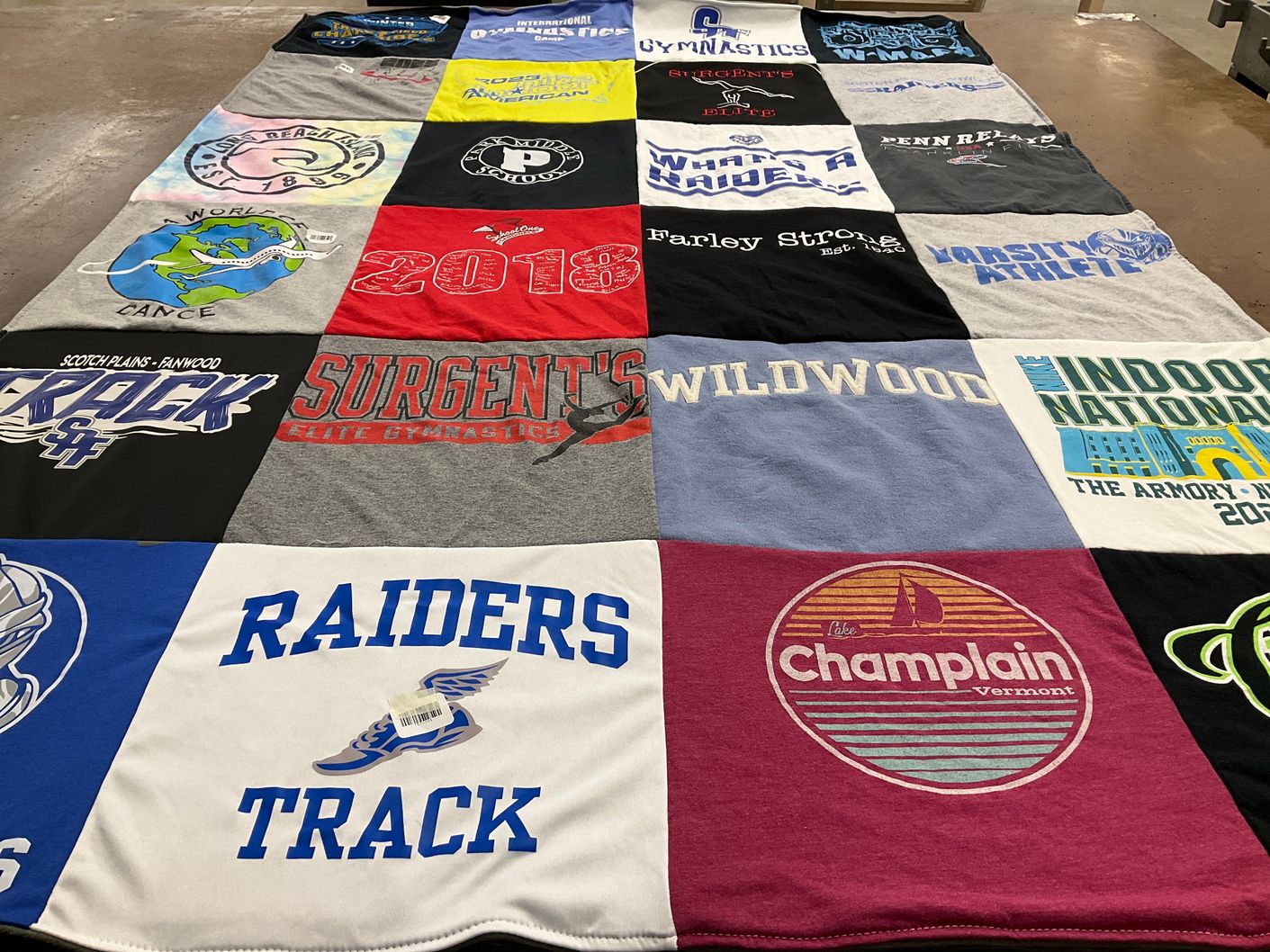 T-shirt quilt featuring raiders track team by Joanmarie from NJ