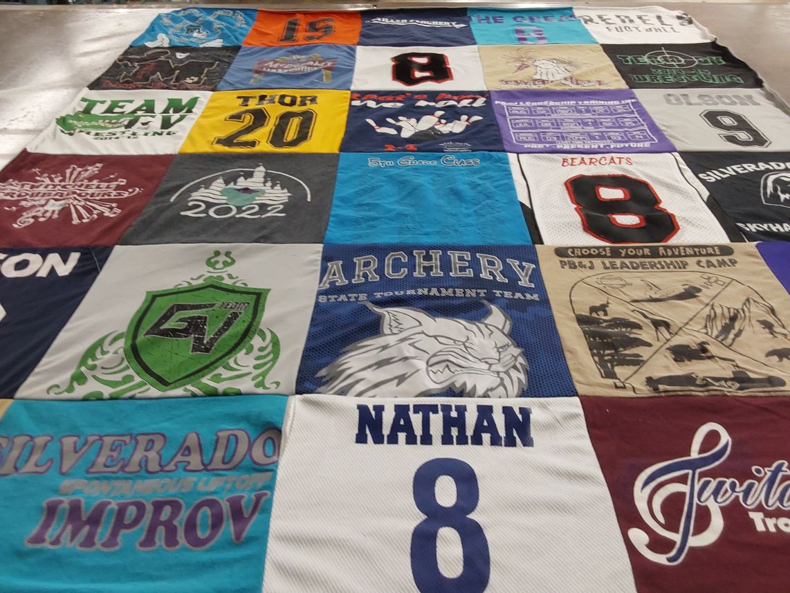 T-shirt quilt featuring bearcats, archery state tournament team by Bradley from NV