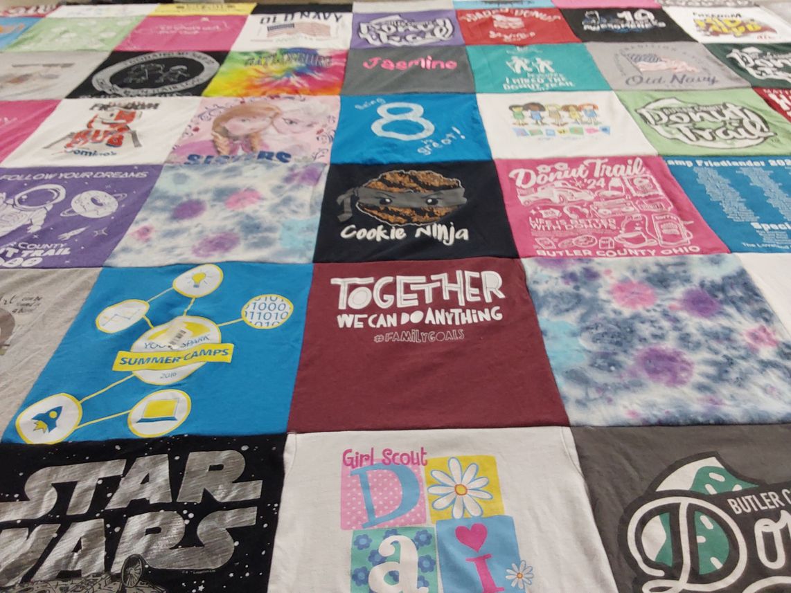 T-shirt quilt with cooking, scouting themes by Nancy from KY