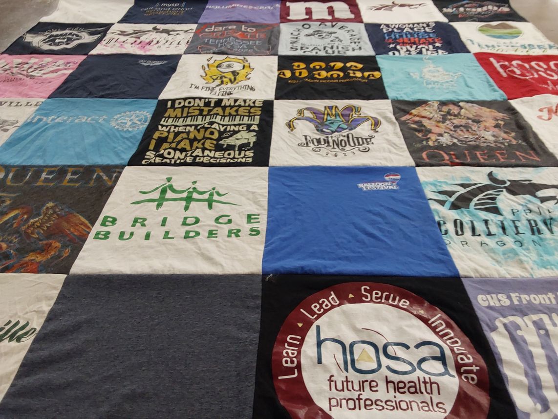 T-shirt quilt with community service, health professions themes by Rachelle from TN