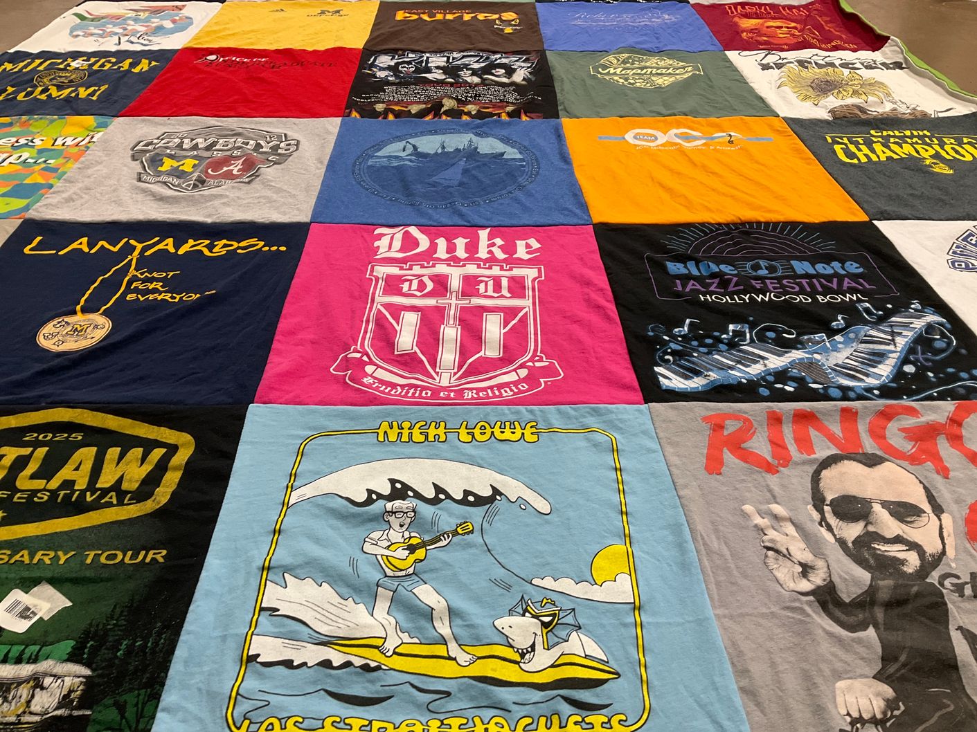 T-shirt quilt featuring university of alabama, university of michigan by Sheila from CA