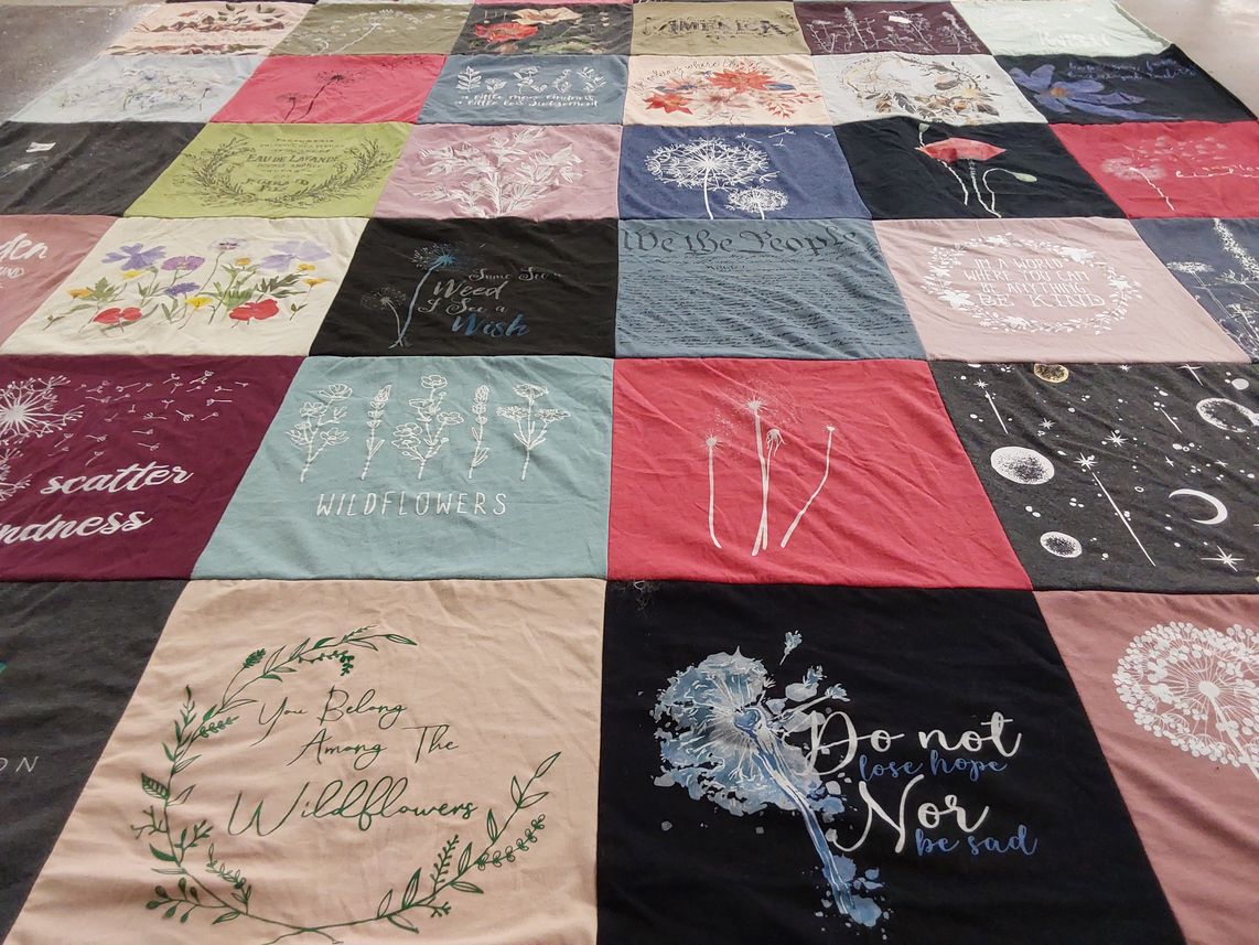 T-shirt quilt with nature, floral themes by Erik from CO
