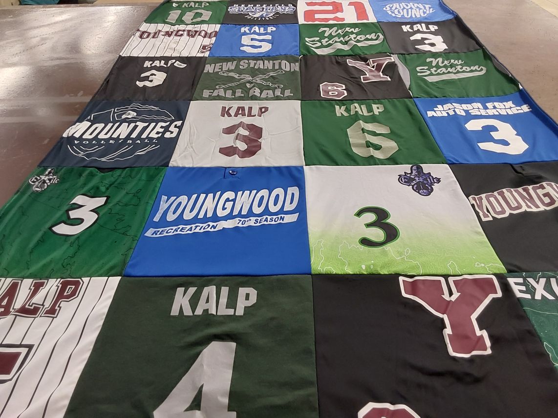 T-shirt quilt with sports, recreation themes by Tabitha from PA