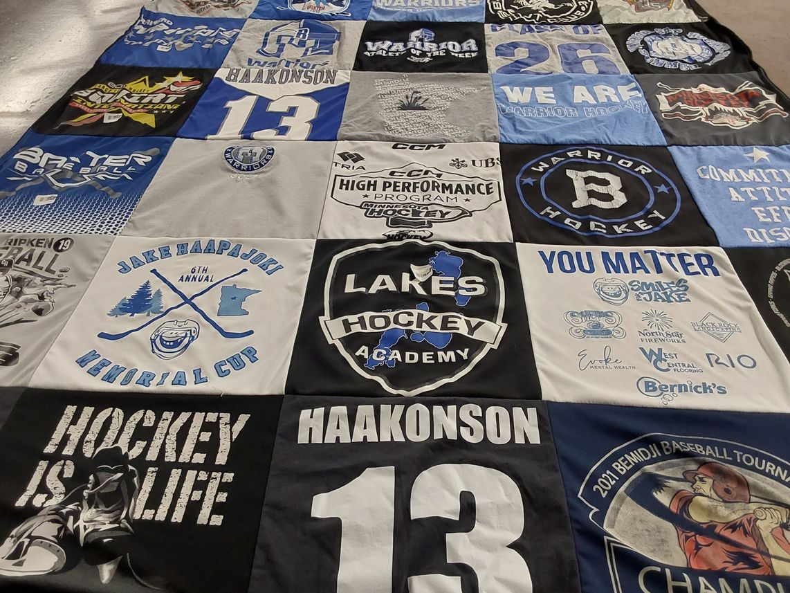 T-shirt quilt featuring warrior hockey by Katie from MN