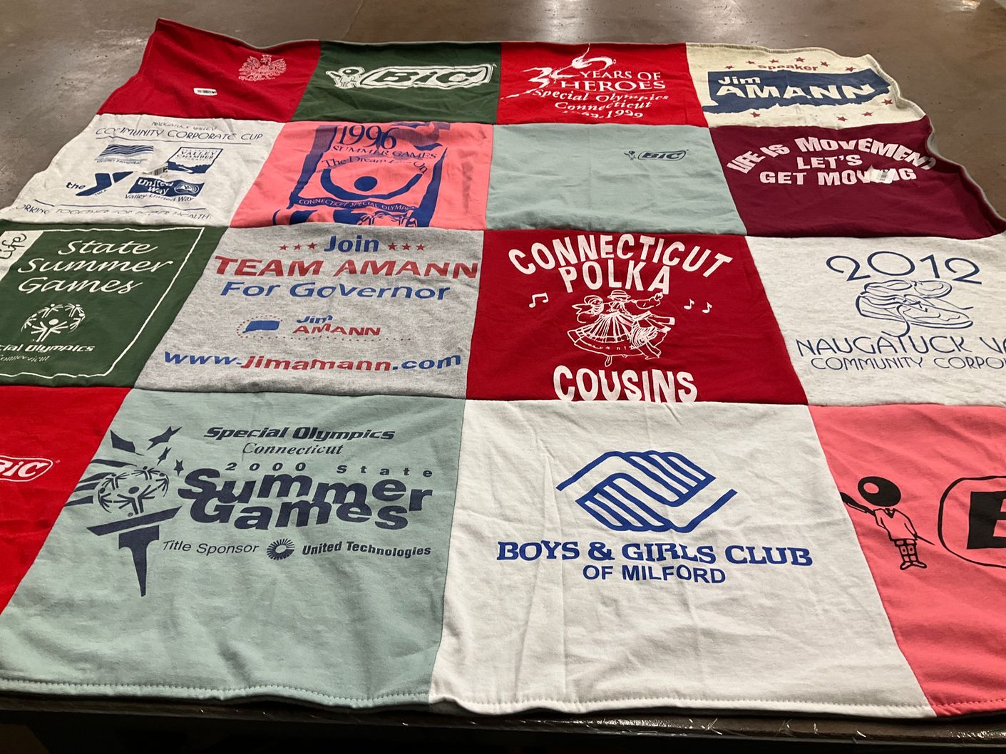 T-shirt quilt with community service, sports themes by Elaine from CT