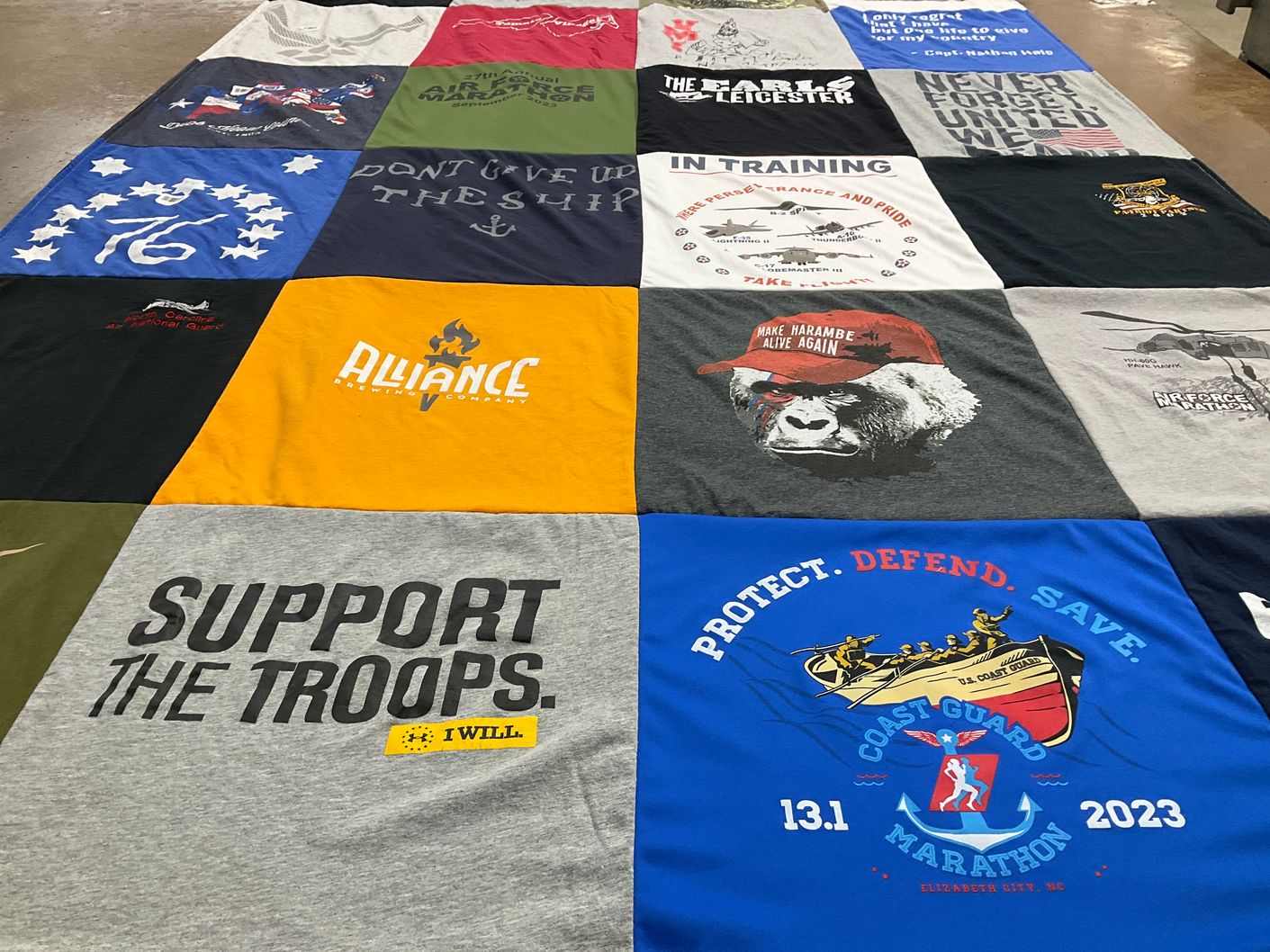 T-shirt quilt with military, supporting troops themes by Hugh from NC