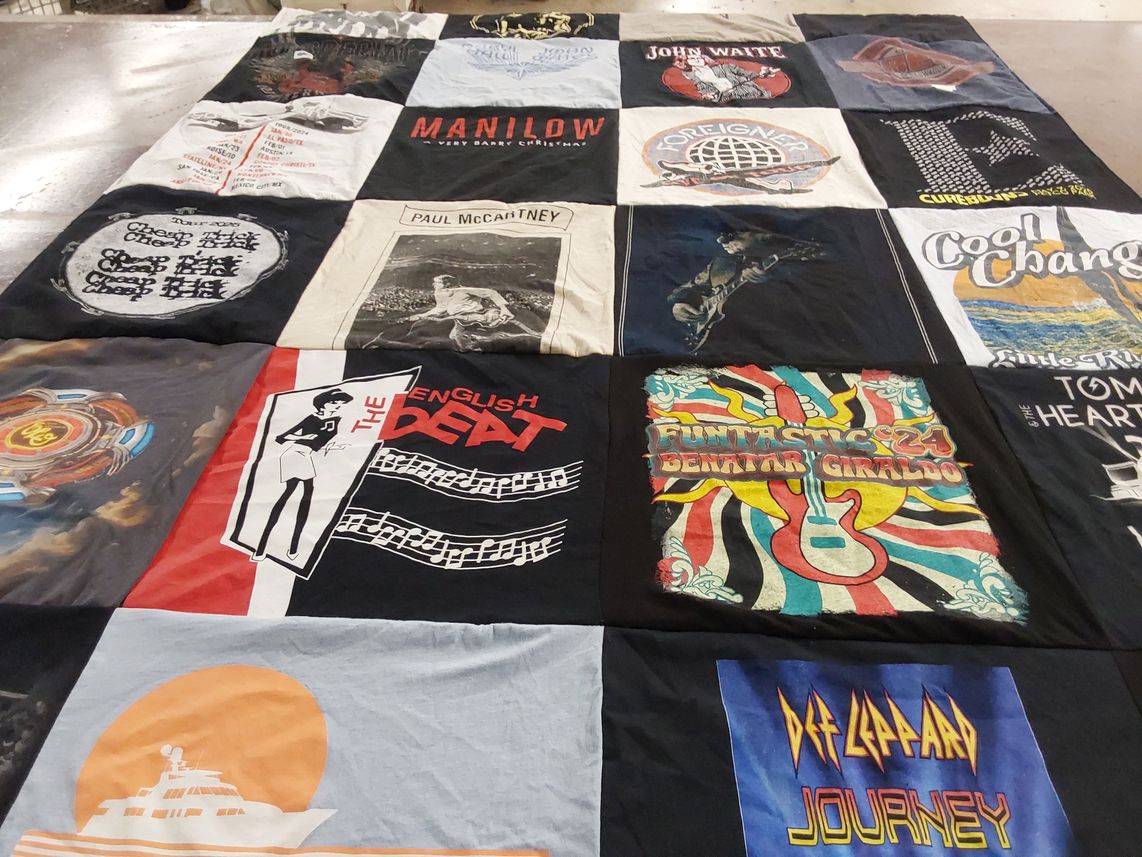 T-shirt quilt with music, concerts themes by Donna from CA