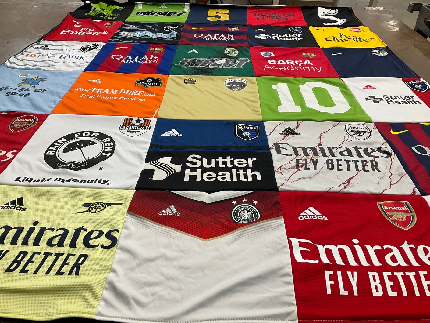 T-shirt quilt featuring arsenal football club by Christina from CA