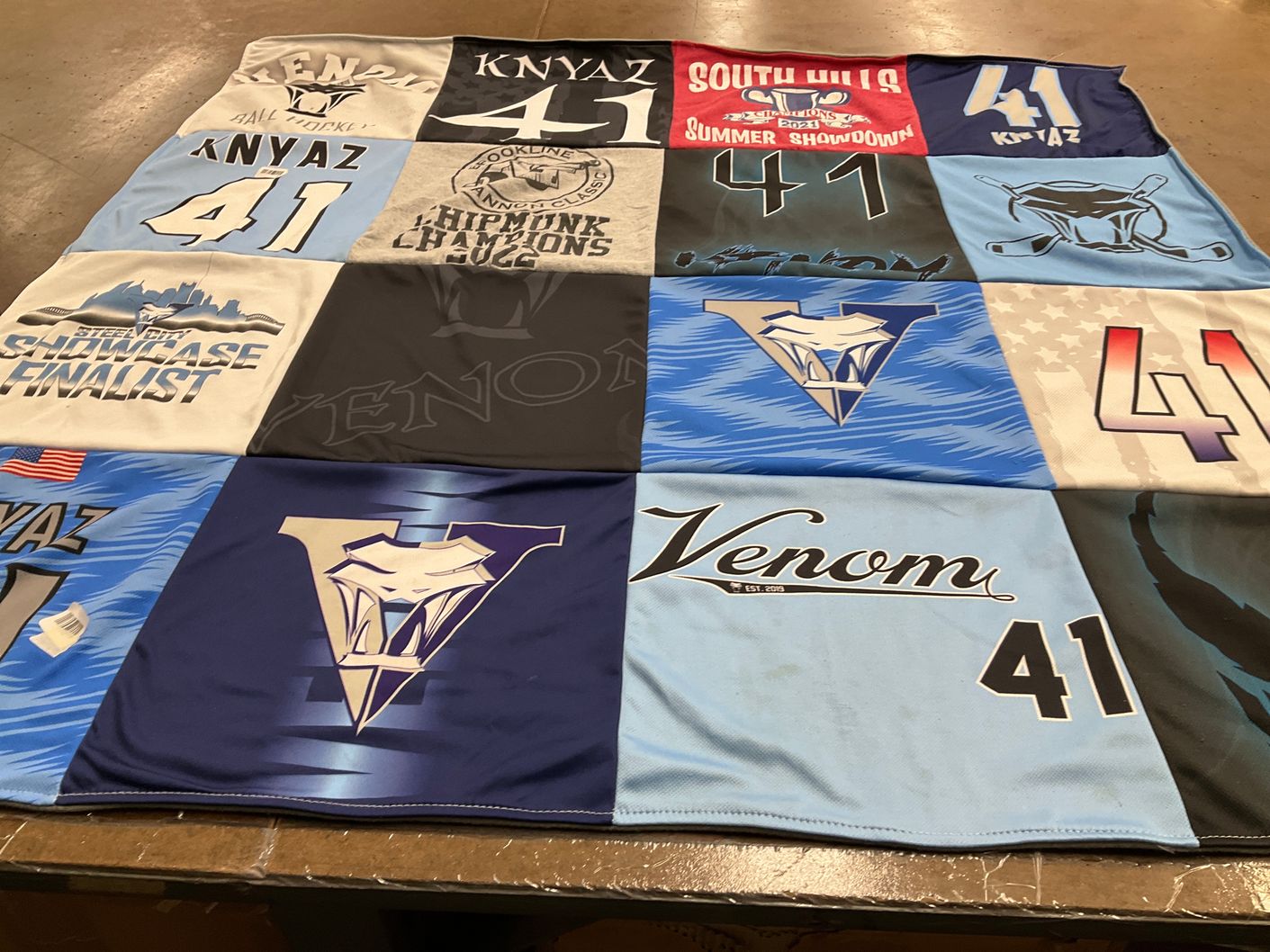 T-shirt quilt with hockey themes by Coribeth from PA