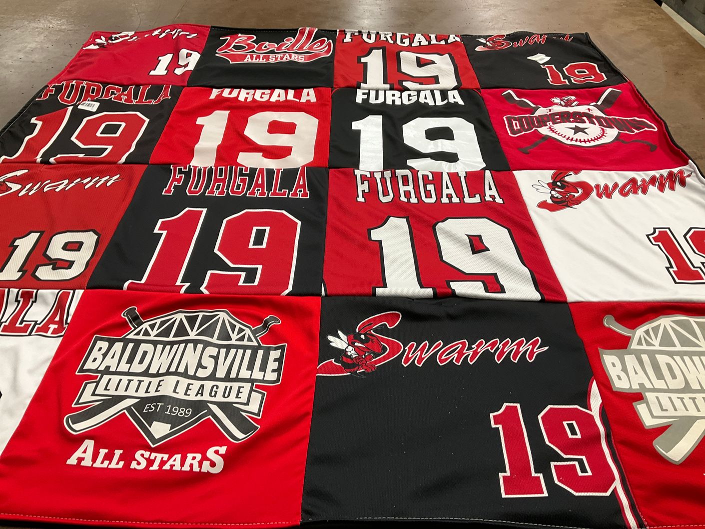 T-shirt quilt featuring baldwinsville swarm by Jenny from NY