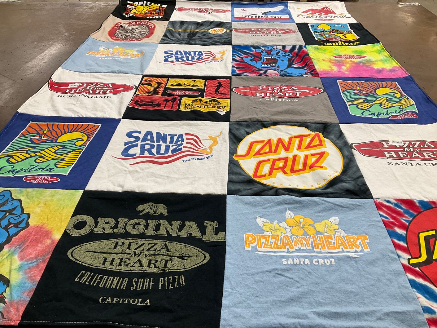 T-shirt quilt with surfing, pizza themes by Christie from CA