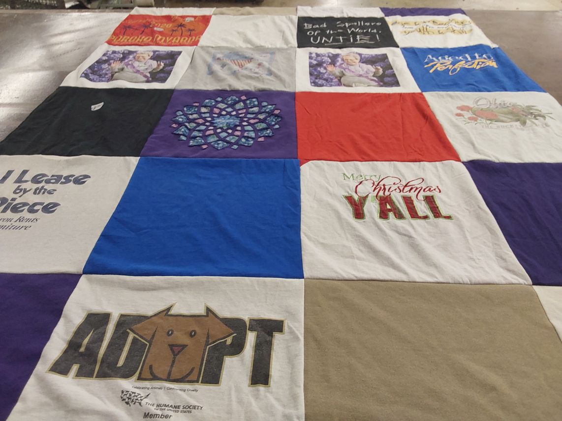 T-shirt quilt with animal adoption, christmas themes by Lisa from GA