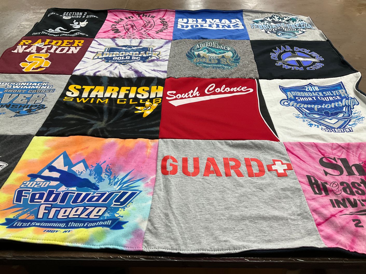 T-shirt quilt featuring adirondack dolphins swim team by Amy from NY
