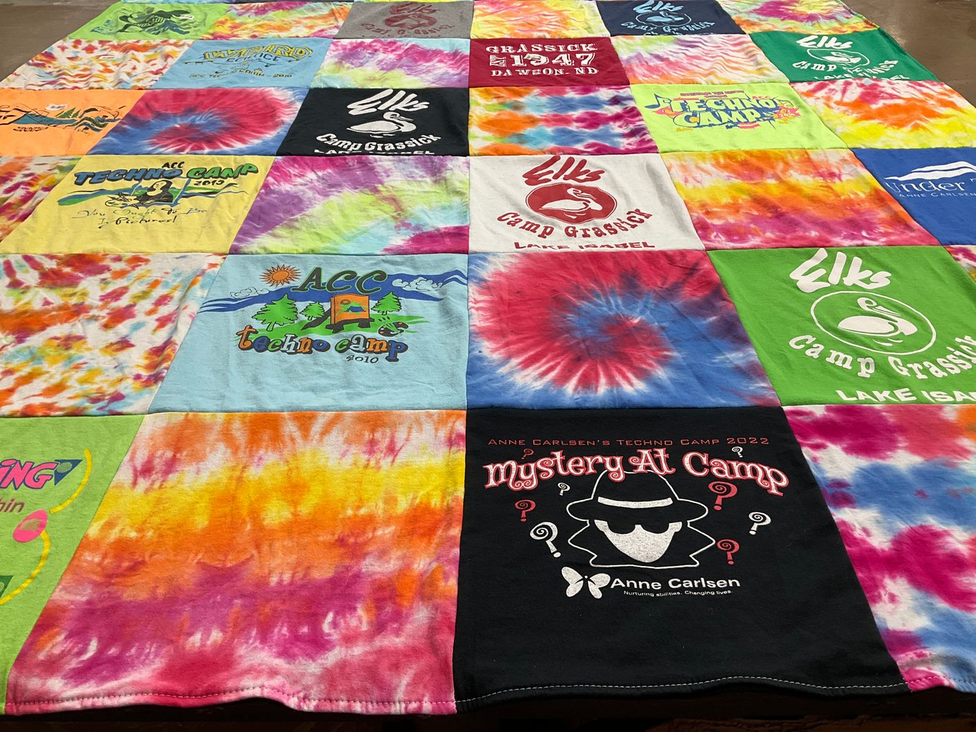 T-shirt quilt with camping, technology themes by Travis from ND