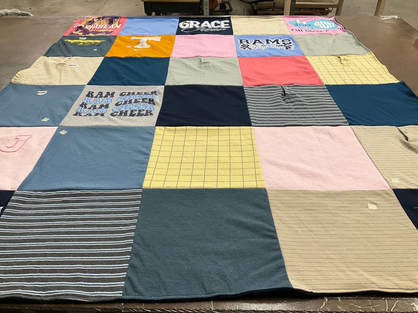 T-shirt quilt with cheerleading themes by Kathy from TN