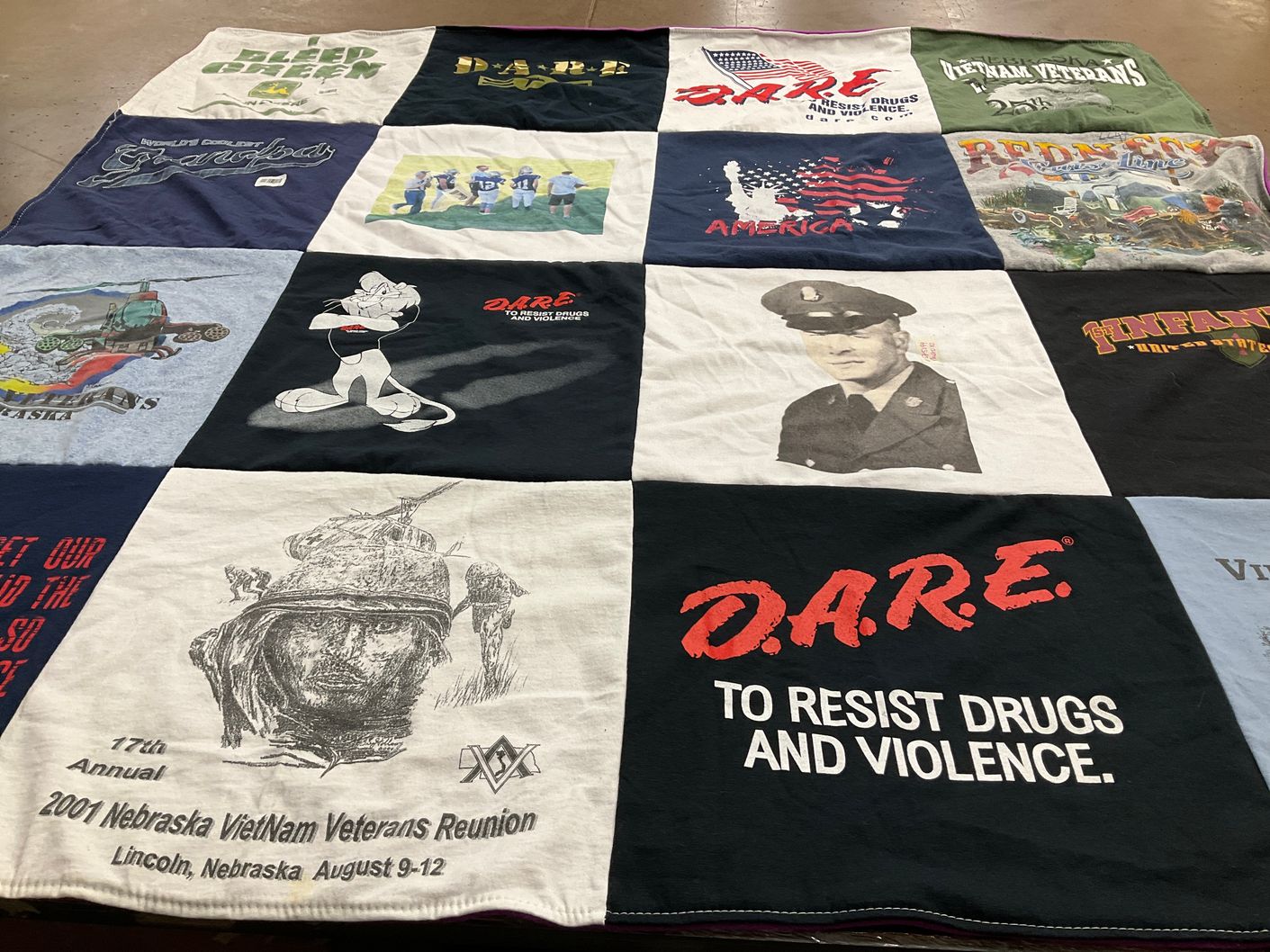 T-shirt quilt with veterans, drug prevention themes by Donna from NE