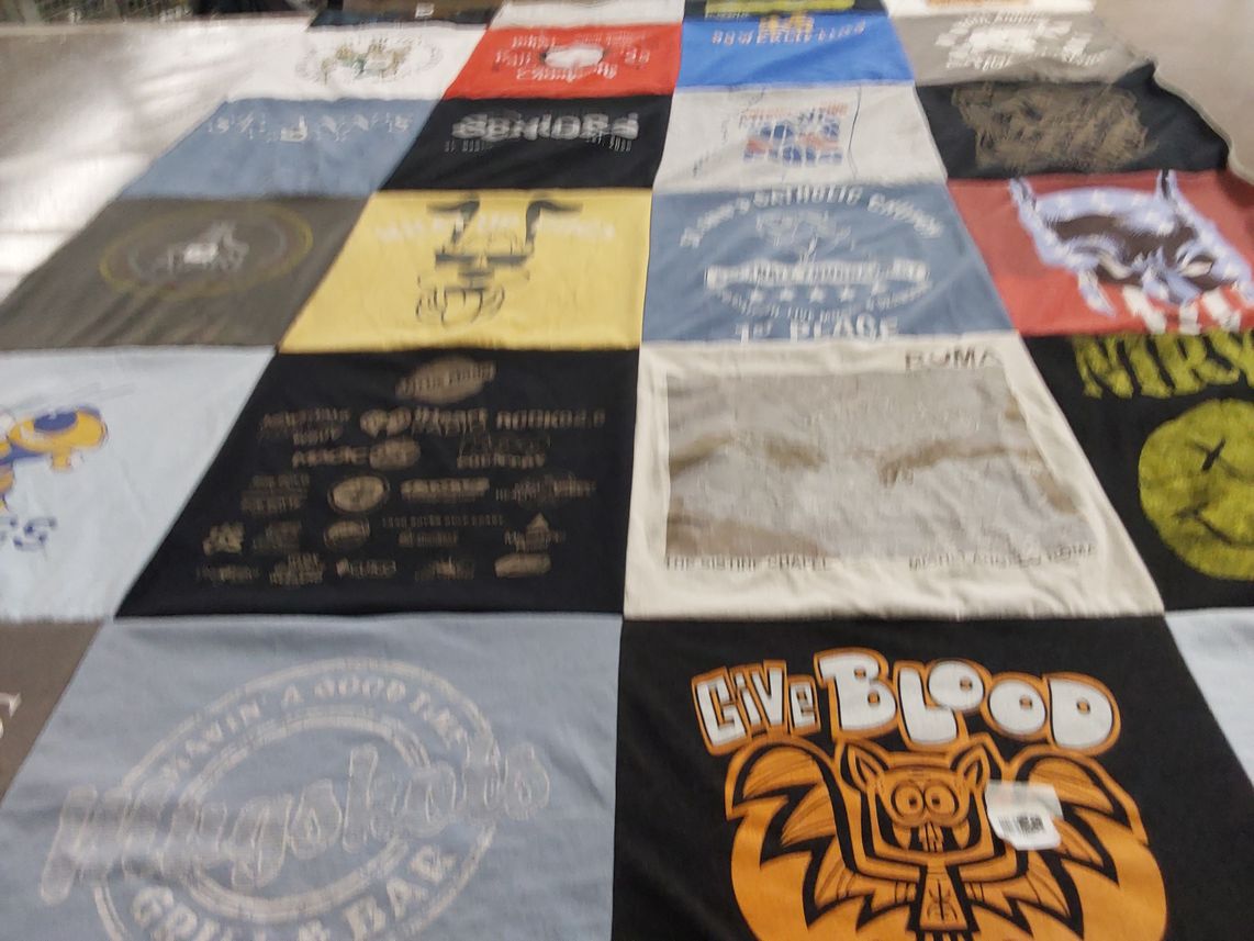 T-shirt quilt with community service, health awareness themes by Lindsey from LA