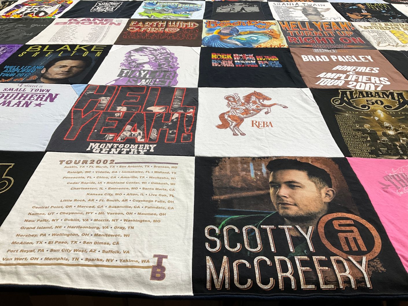 T-shirt quilt with country music themes by Kim from NV