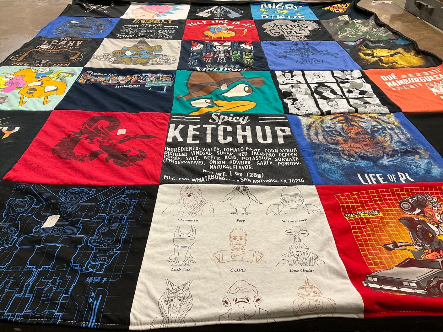 T-shirt quilt with cartoons, movies themes by Paola from CO