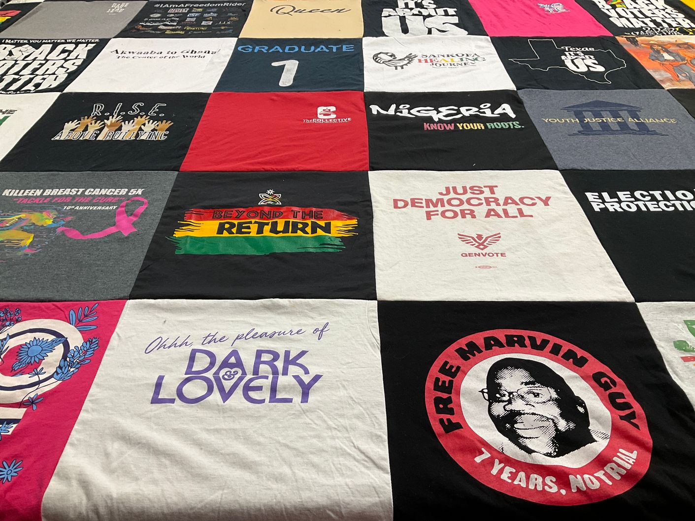T-shirt quilt with community, activism themes by Shevann from TX