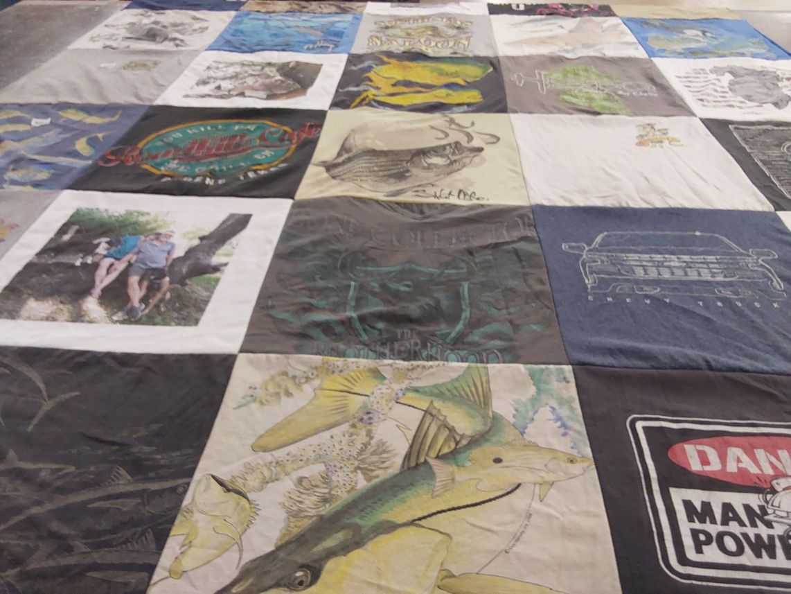 T-shirt quilt with fishing, outdoors themes by Jennifer from FL