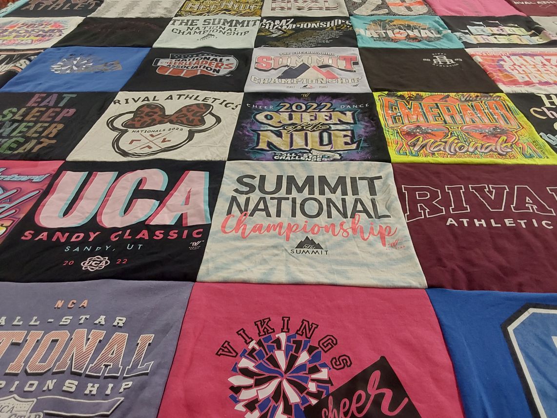 T-shirt quilt with cheerleading, dance themes by Amber from UT
