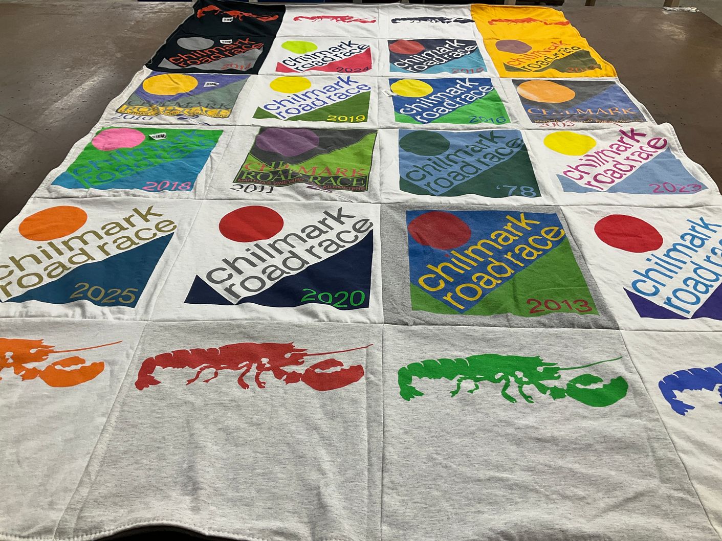 T-shirt quilt with running, community events themes by Lauren from NJ