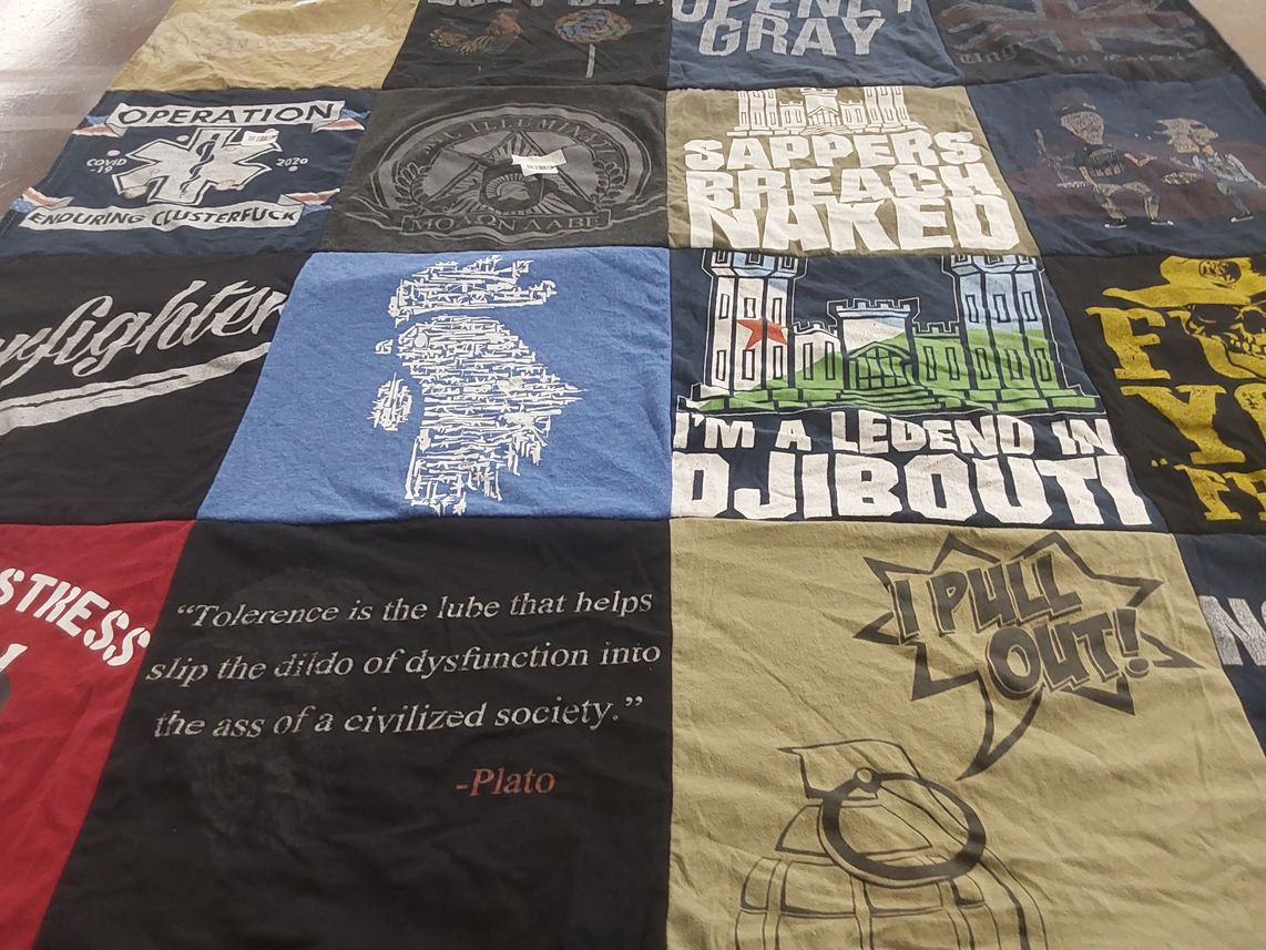 T-shirt quilt with military, philosophy themes by Briana from VT