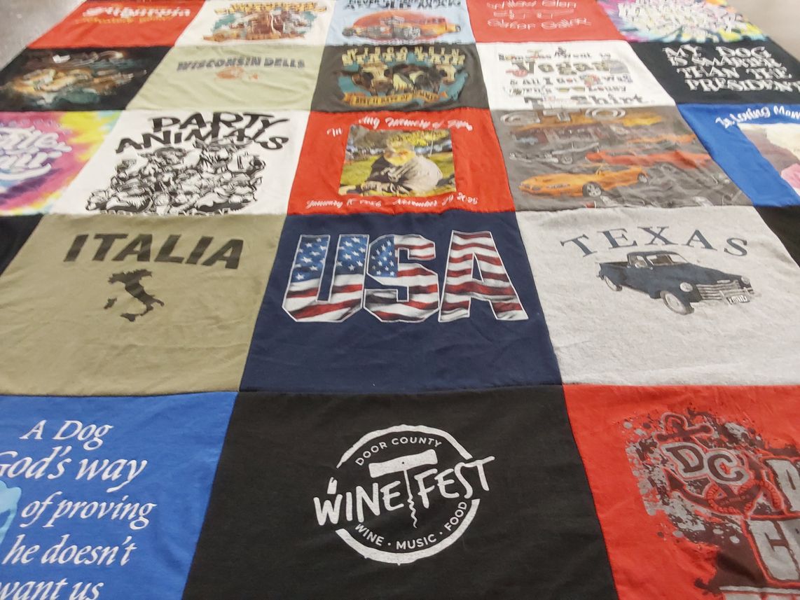 T-shirt quilt with travel, food themes by Robin from WI