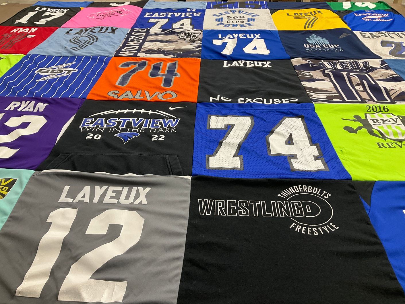 T-shirt quilt featuring thunderbolts wrestling by Melissa from MN