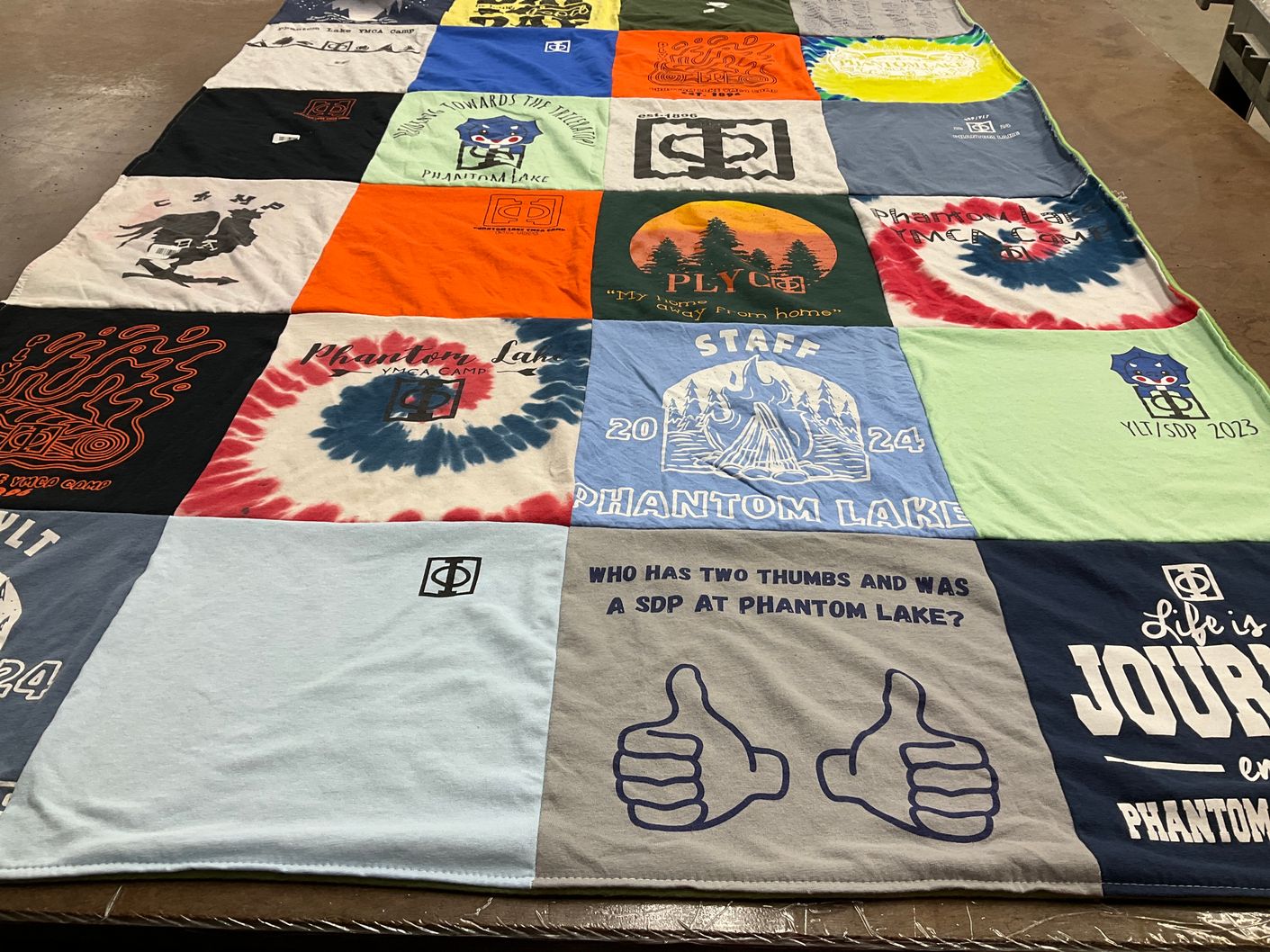 T-shirt quilt with camping, outdoor activities themes by Rhiannon from IL