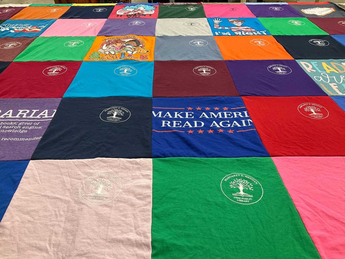 T-shirt quilt with reading, literature themes by Sheila from NJ