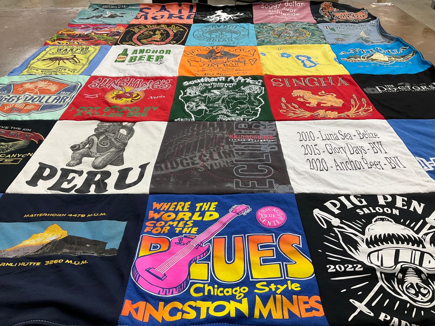 T-shirt quilt with travel, music themes by Daniela from IL
