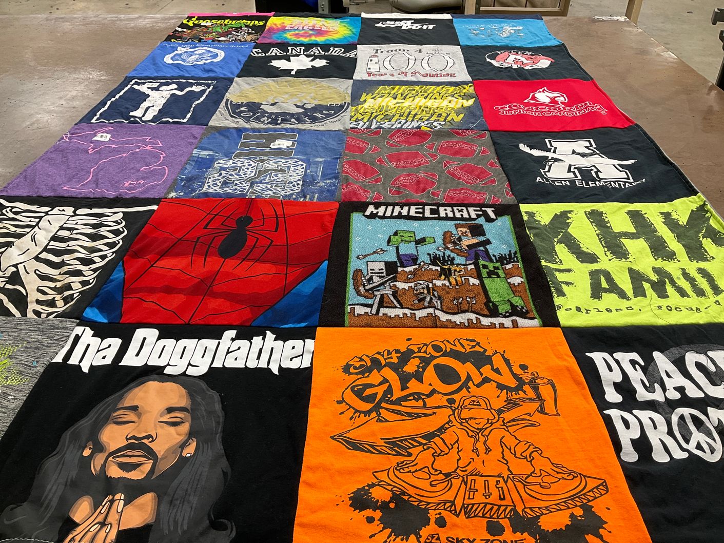 T-shirt quilt with music, gaming themes by Melanie from MI