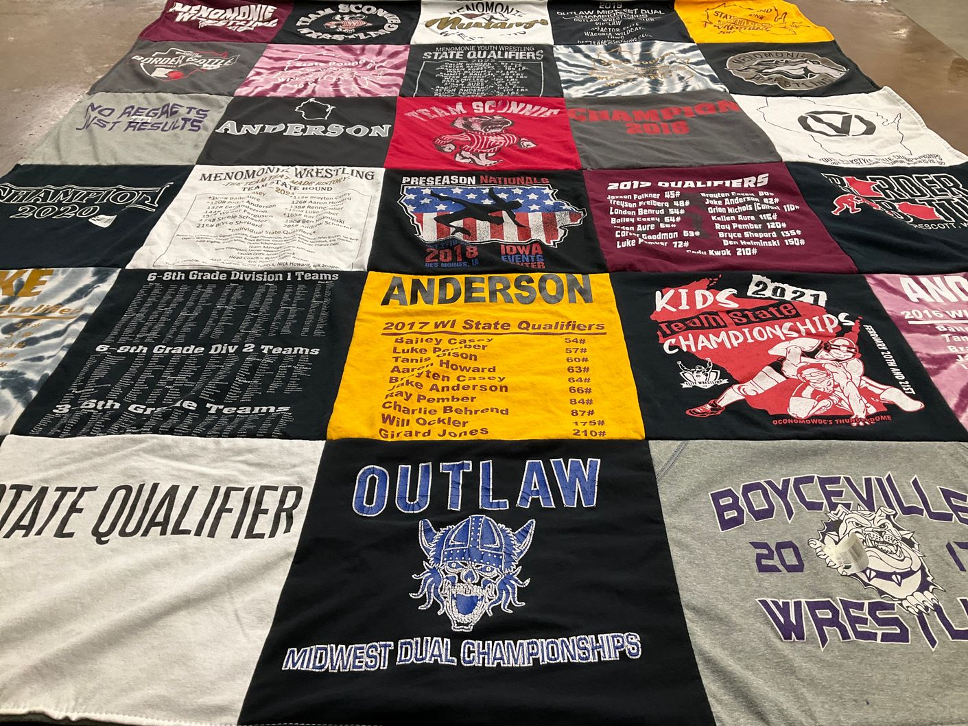 T-shirt quilt featuring outlaw wrestling team, menomonie wrestling team by Julie from WI