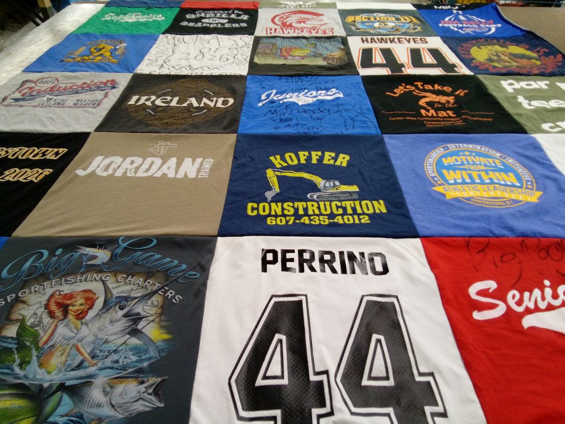 T-shirt quilt with fishing, graduation themes by Colleen from NY