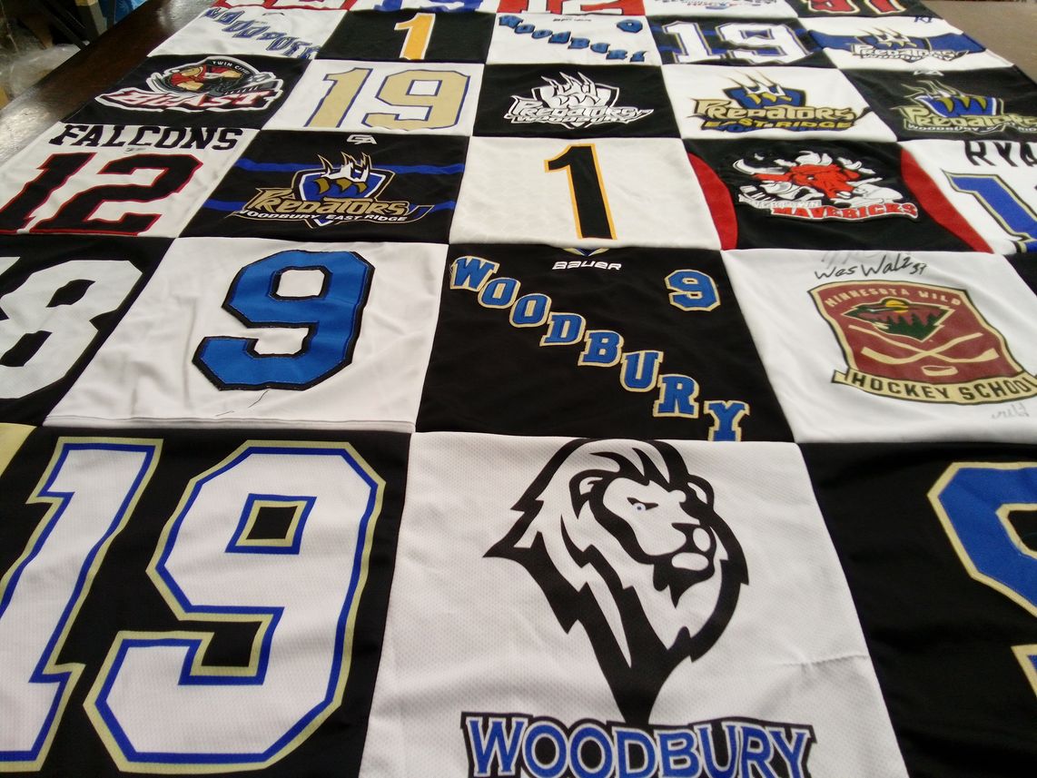 T-shirt quilt featuring woodbury high school hockey team by Janel from MN