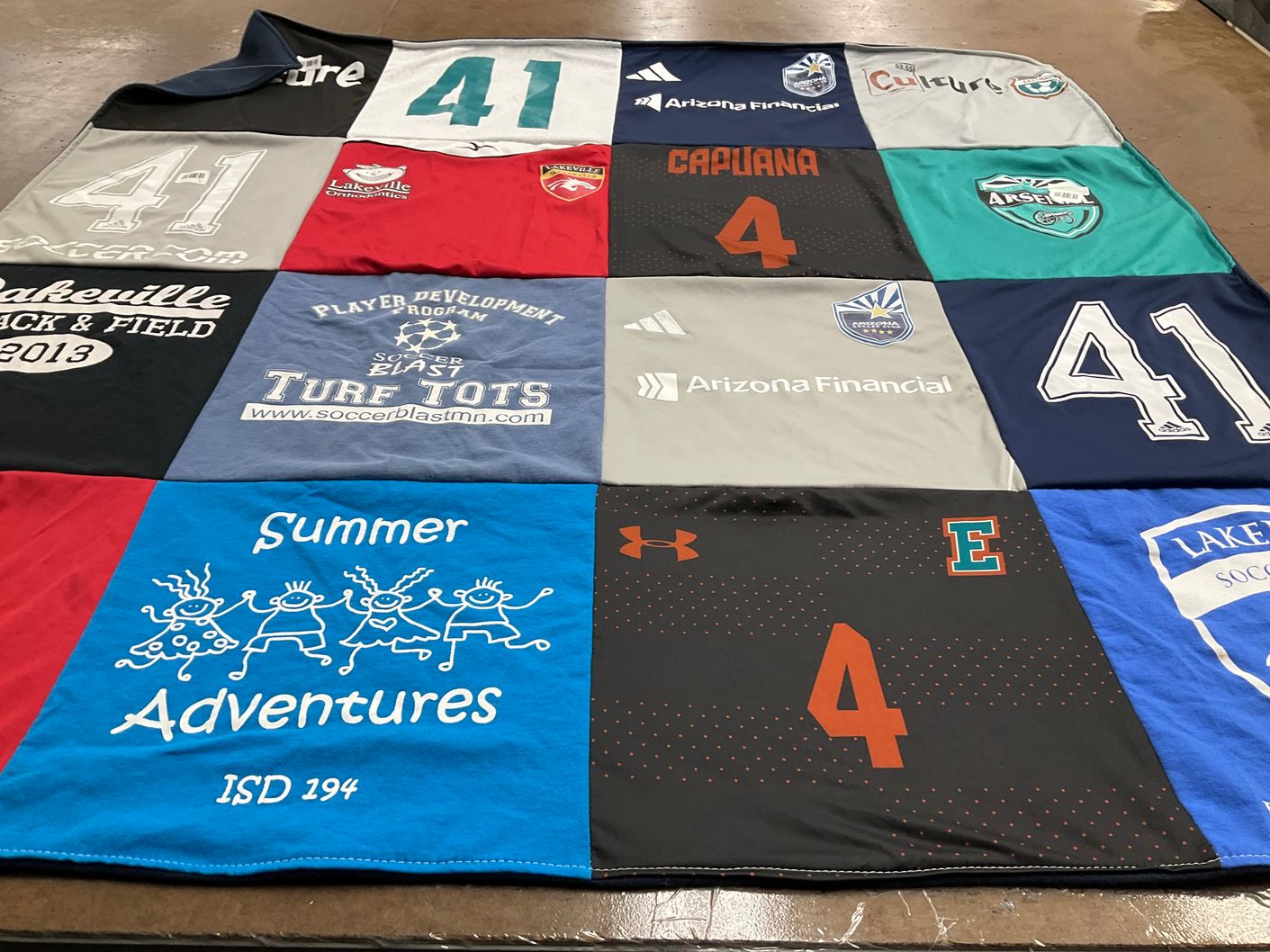 T-shirt quilt featuring lakeville soccer team by Laura from AZ