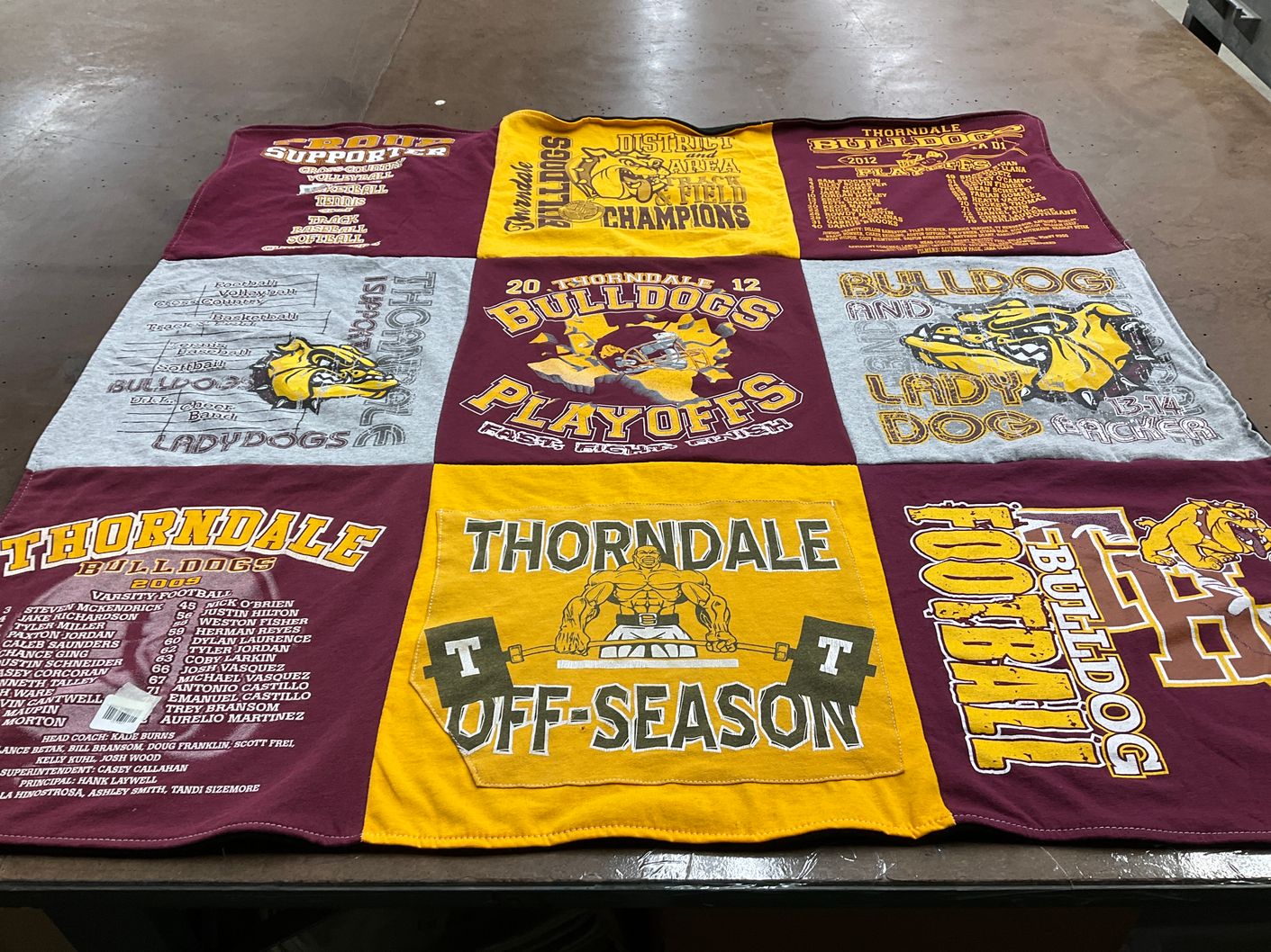 T-shirt quilt featuring thorne dale bulldogs, thorne dale lady dogs by Jayson from TX