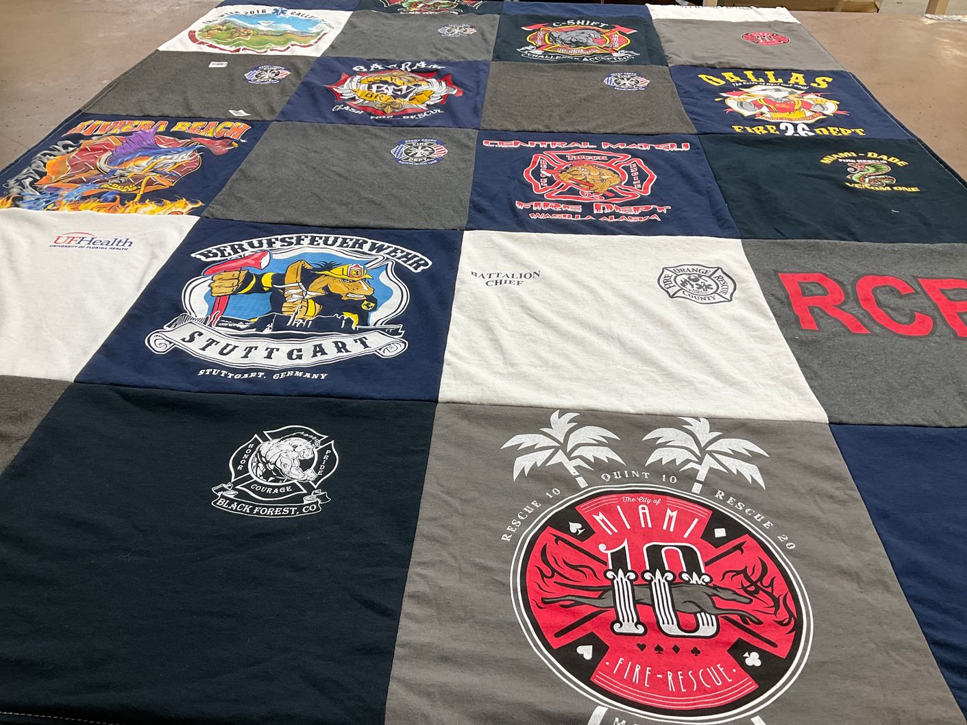 T-shirt quilt with firefighting, emergency services themes by Jessica from FL