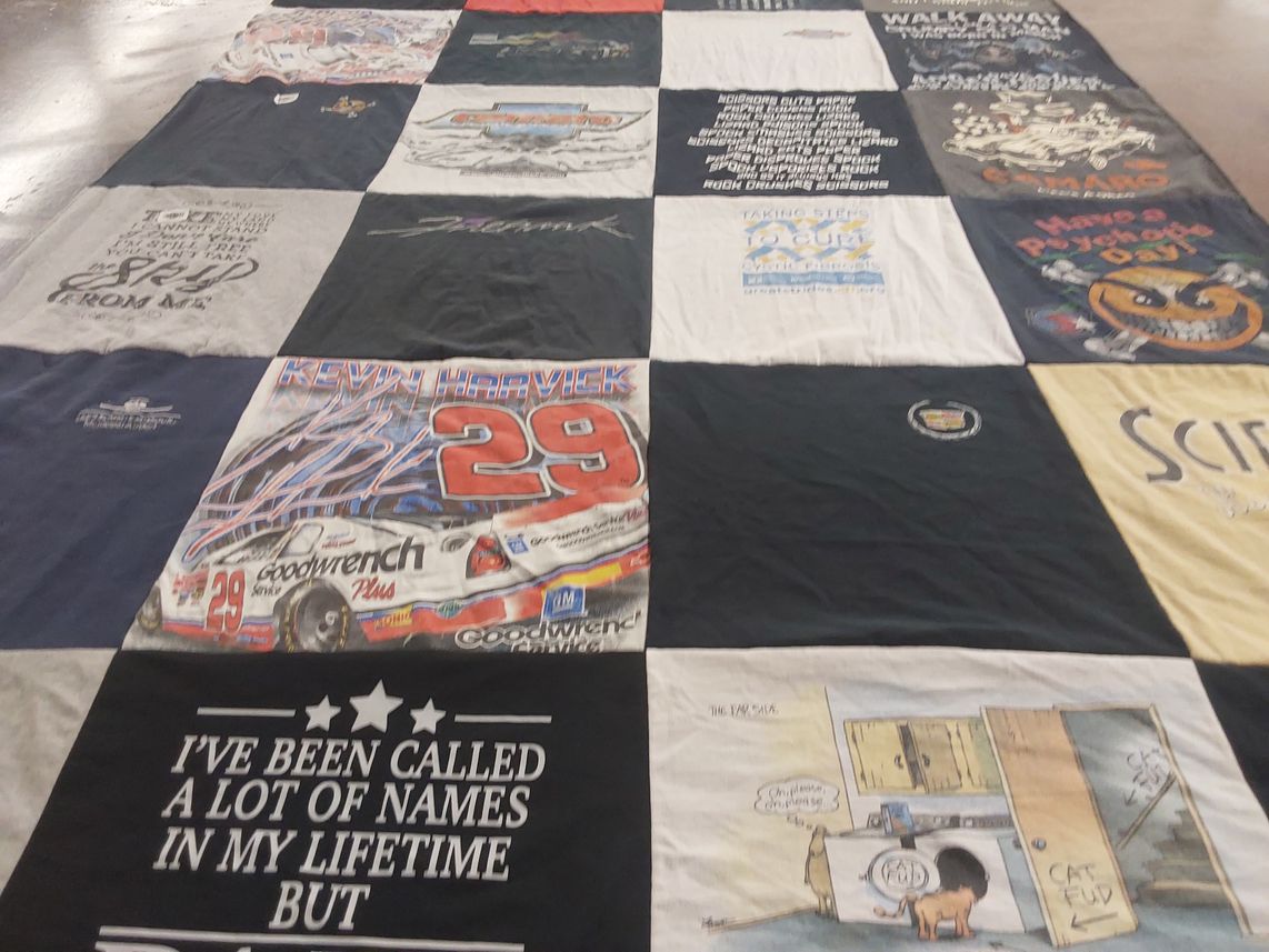 T-shirt quilt with nascar, humor themes by Carla from MO