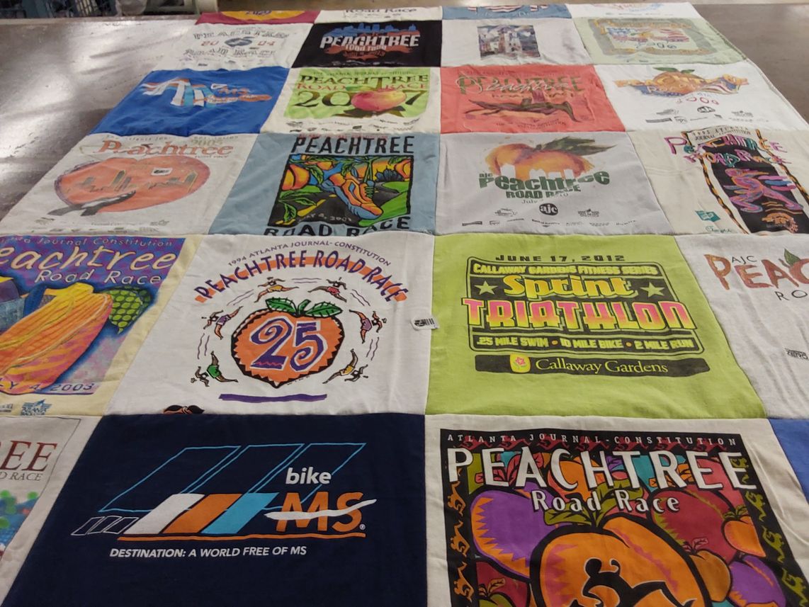 T-shirt quilt with running, triathlon themes by JULIE from GA