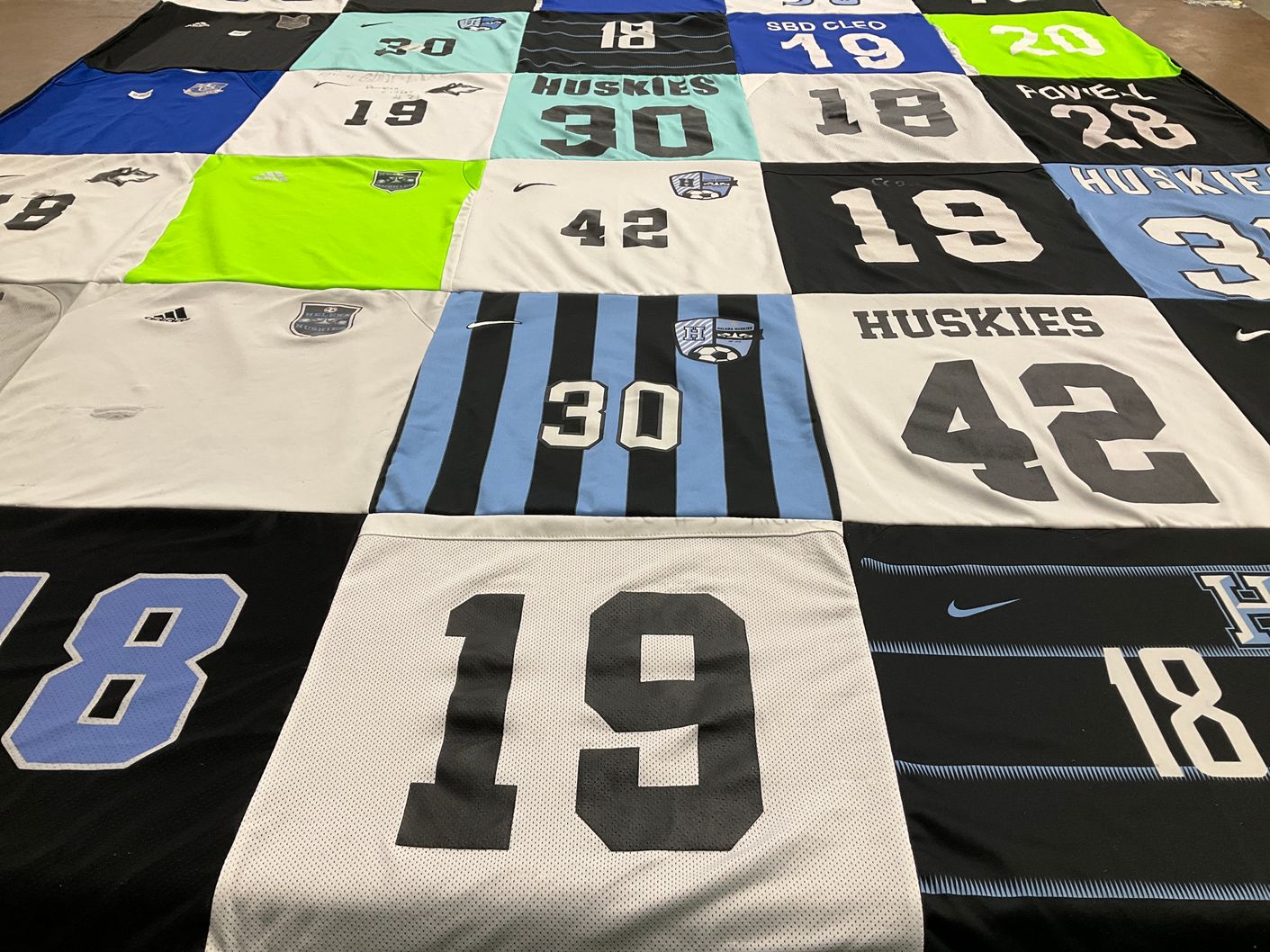 T-shirt quilt featuring huskies by RARIA from AL
