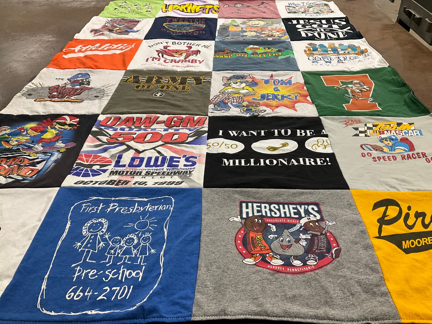 T-shirt quilt with nascars, cartoons themes by Jodie from NC